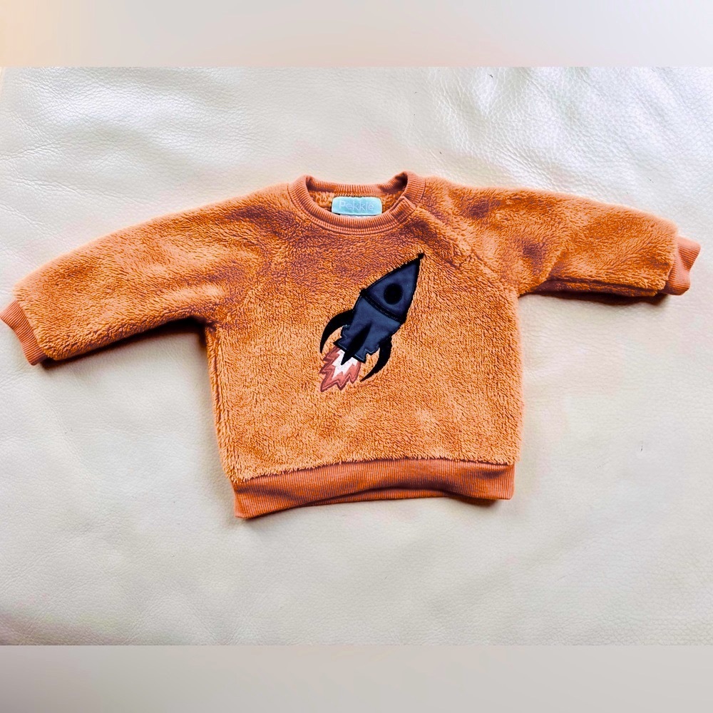 4/$21💥Pekkle Ultra Fuzzy Rocketship Space Astronaut Sweatshirt, Cinnamon Brown